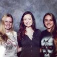 Summer Glau posing with fans at MegaCon
