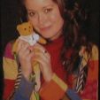 Summer Glau poses with a signed teddy bear