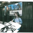 Summer Glau signing autographs at her booth at Ohio Comic Con 2013